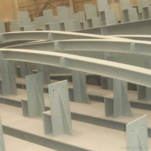 Long steel I-beam with precision camber