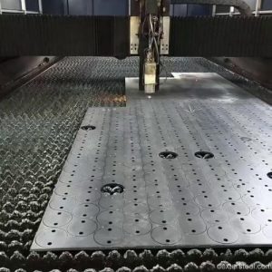 fiber laser cutting into a steel sheet