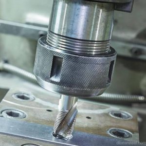 `CNC Rigid Tapping in a Machining Center`